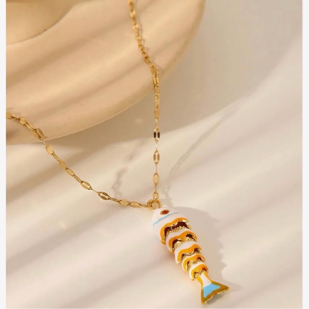 Anthropologie Gold and White Enamel Fish Pendant Necklace with Blue Accent - Picture 2 of 4
